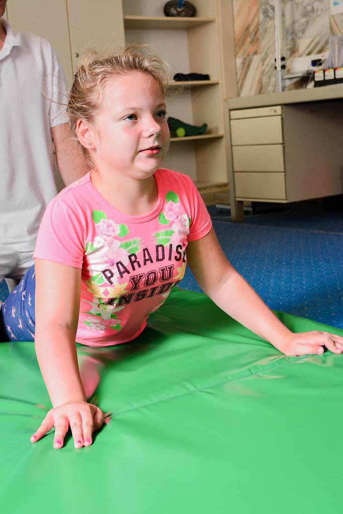 Patient with a ball during physical therapy
